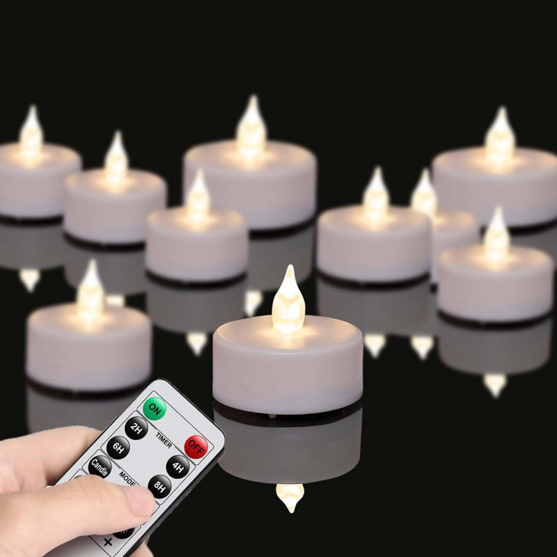 The Holiday Aisle LED Tea Lights With Remote Control Battery Operated Bulk Realistic And Bright Flickering Long Lasting 400 Hours Flameless Candles For Home Decor Holiday Wedding Party 24Pack Warmwhit...